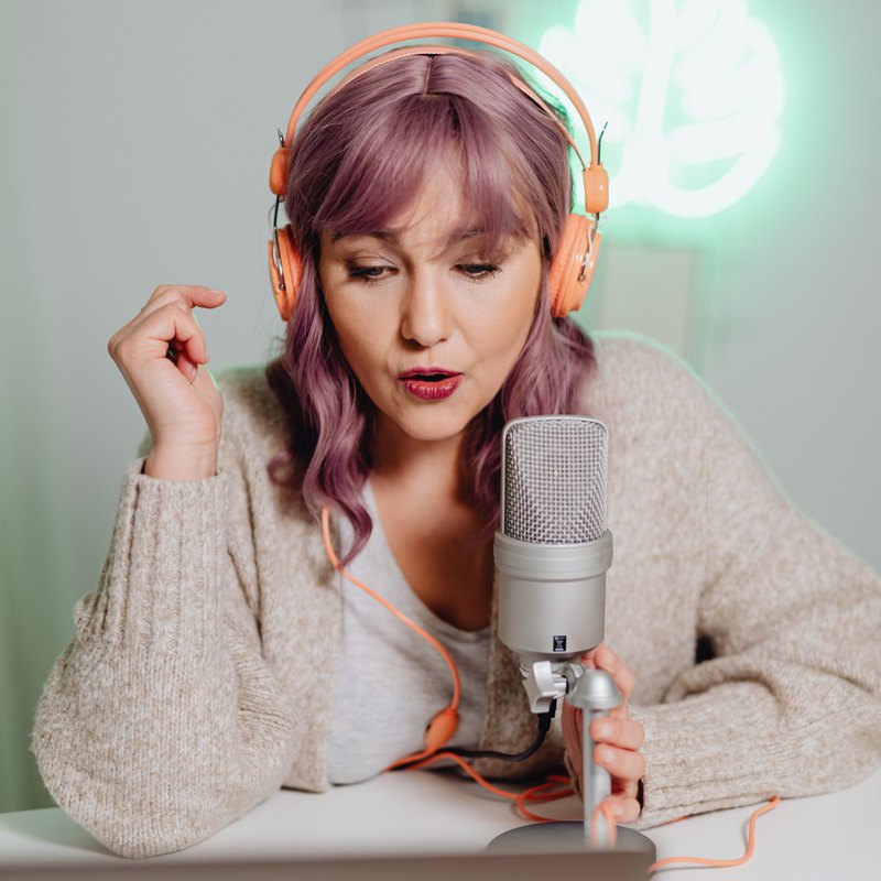 A creator recording a podcast